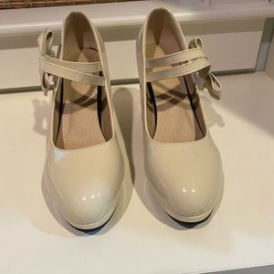 Almost new Ivory Mary Janes with chunky help! Worn once!